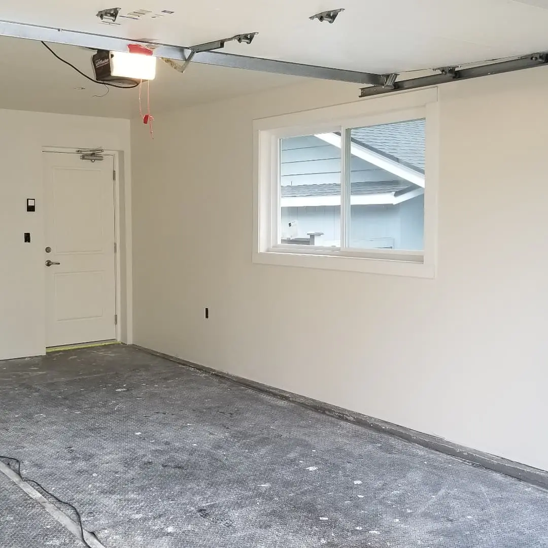 A garage with no one in it is being remodeled.